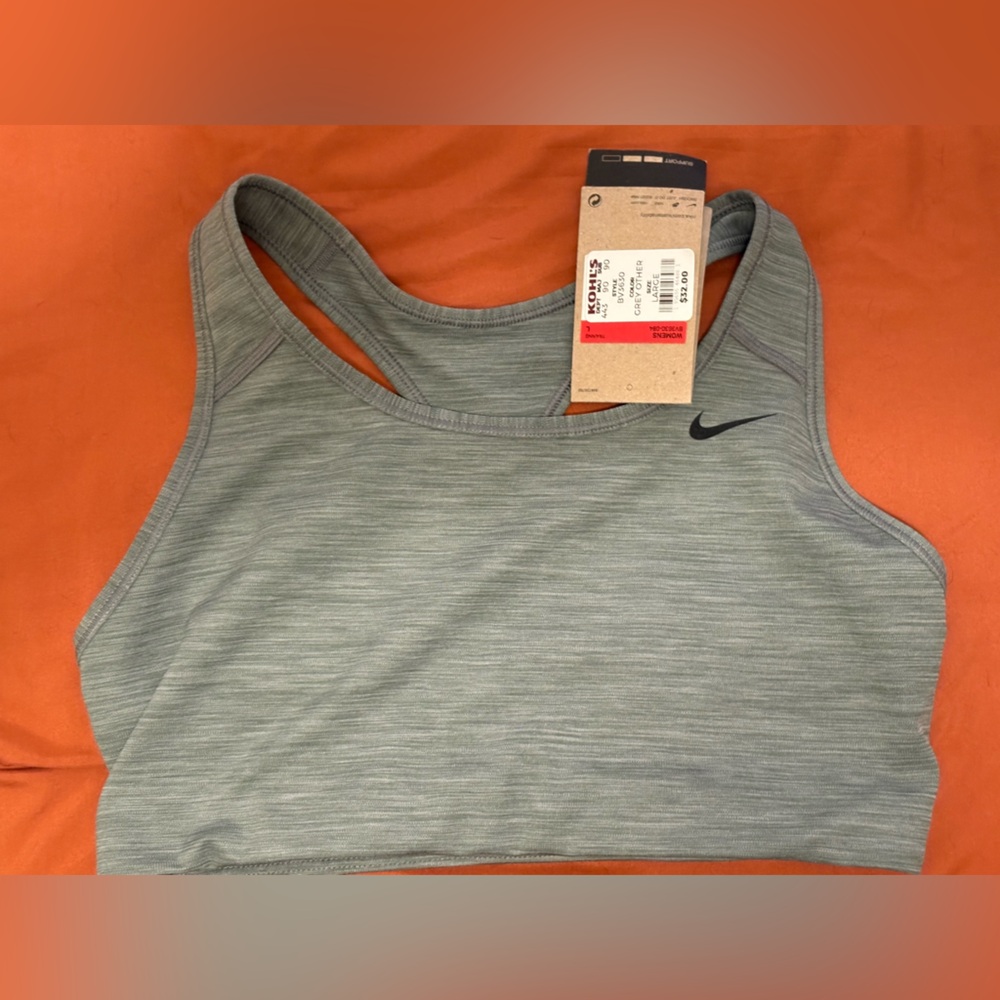 Nike Heather Gray swoosh sports bra. Brand new with tags. Size large $25